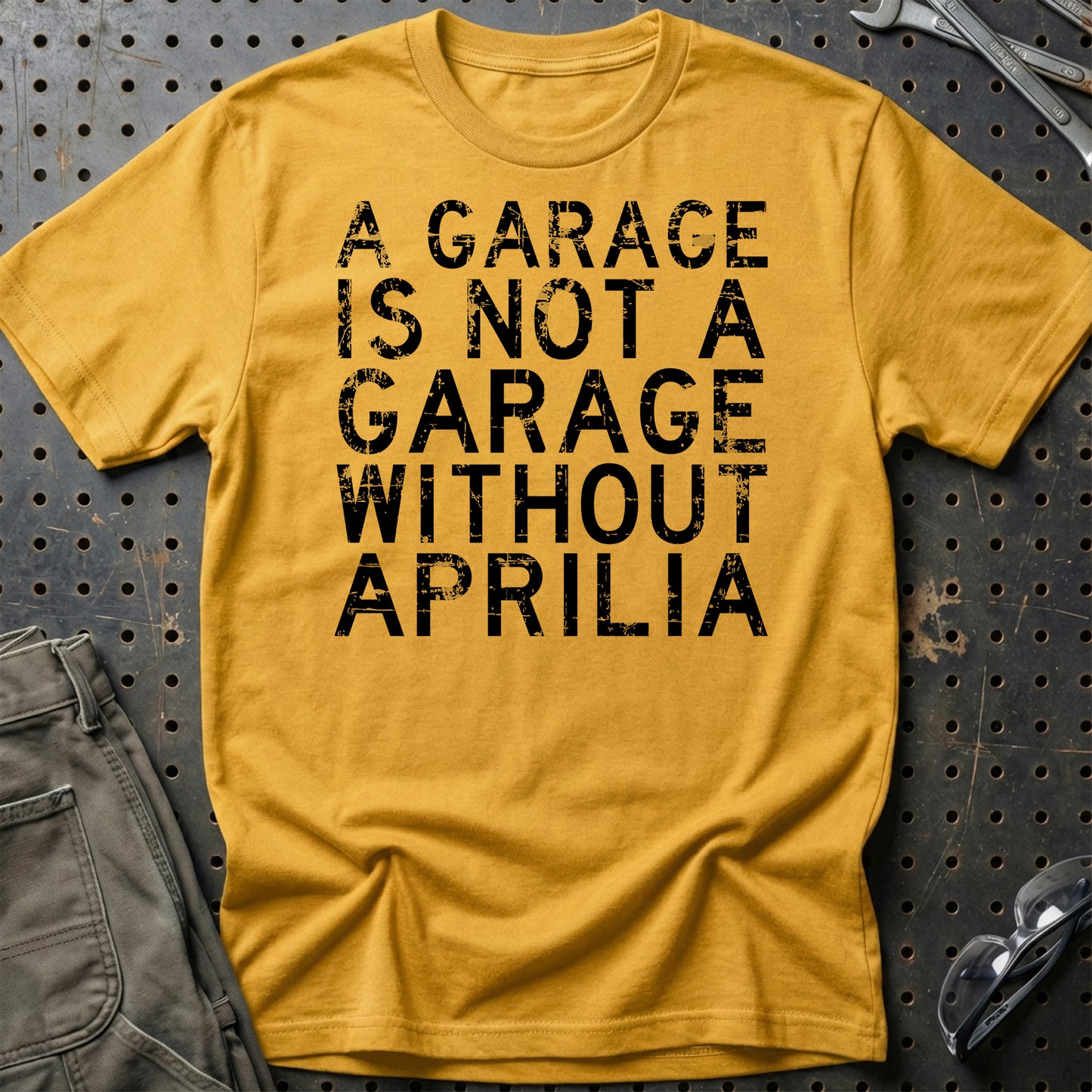 Aprilia - A Garage Is Not A Garage Without Aprilia - Unisex T-Shirt , Bomuld-Beklædning-Aprilia-Guld-S-Garage Culture Shop- garage - man cave - merchandise