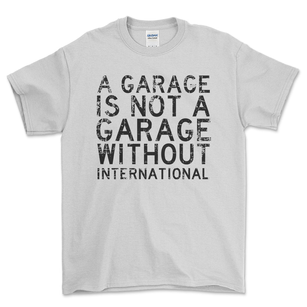 International - A Garage Is Not A Garage Without International - Unisex T-Shirt , Bomuld-Beklædning-International-Hvid-S-Forside-Garage Culture Shop- garage - man cave - merchandise