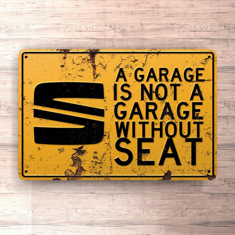 Seat A Garage Is Not A Garage Without Seat Skilte, Musemåtte, Dørmåtte , Plakat-Skilte-Seat-Garage Culture Shop- garage - man cave - merchandise