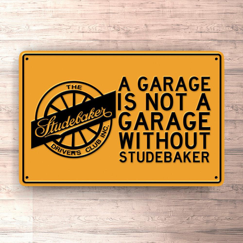 Studebaker A Garage Is Not A Garage Without Studebaker Skilte, Musemåtte, Dørmåtte-Skilte-Studebaker-Garage Culture Shop- garage - man cave - merchandise