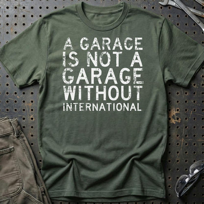 International - A Garage Is Not A Garage Without International - Unisex T-Shirt , Bomuld-Beklædning-International-Grøn Militær-S-Garage Culture Shop- garage - man cave - merchandise