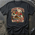 
Marineret i rustløsner – Stadig stædig – Unisex T-Shirt – Sort