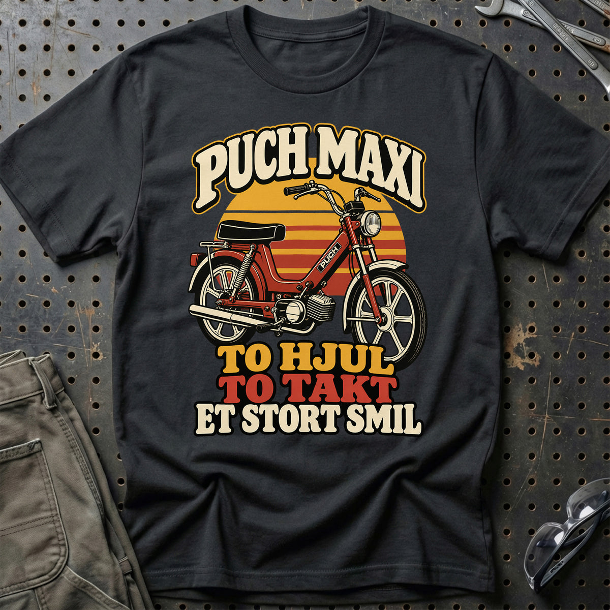 
Puch Maxi – To hjul, to takt, et stort smil – Unisex T-Shirt – Sort