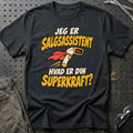 
Salgsassistent – Hvad er din superkraft? – Unisex T-Shirt – Sort