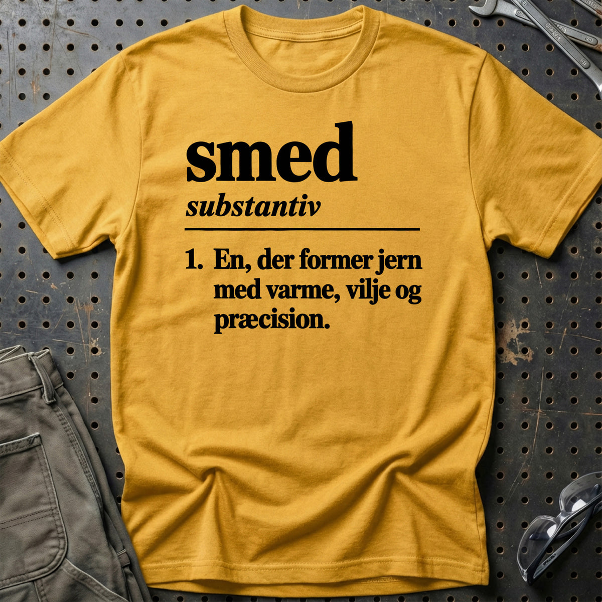 
Smed – Definition T-Shirt – Guld