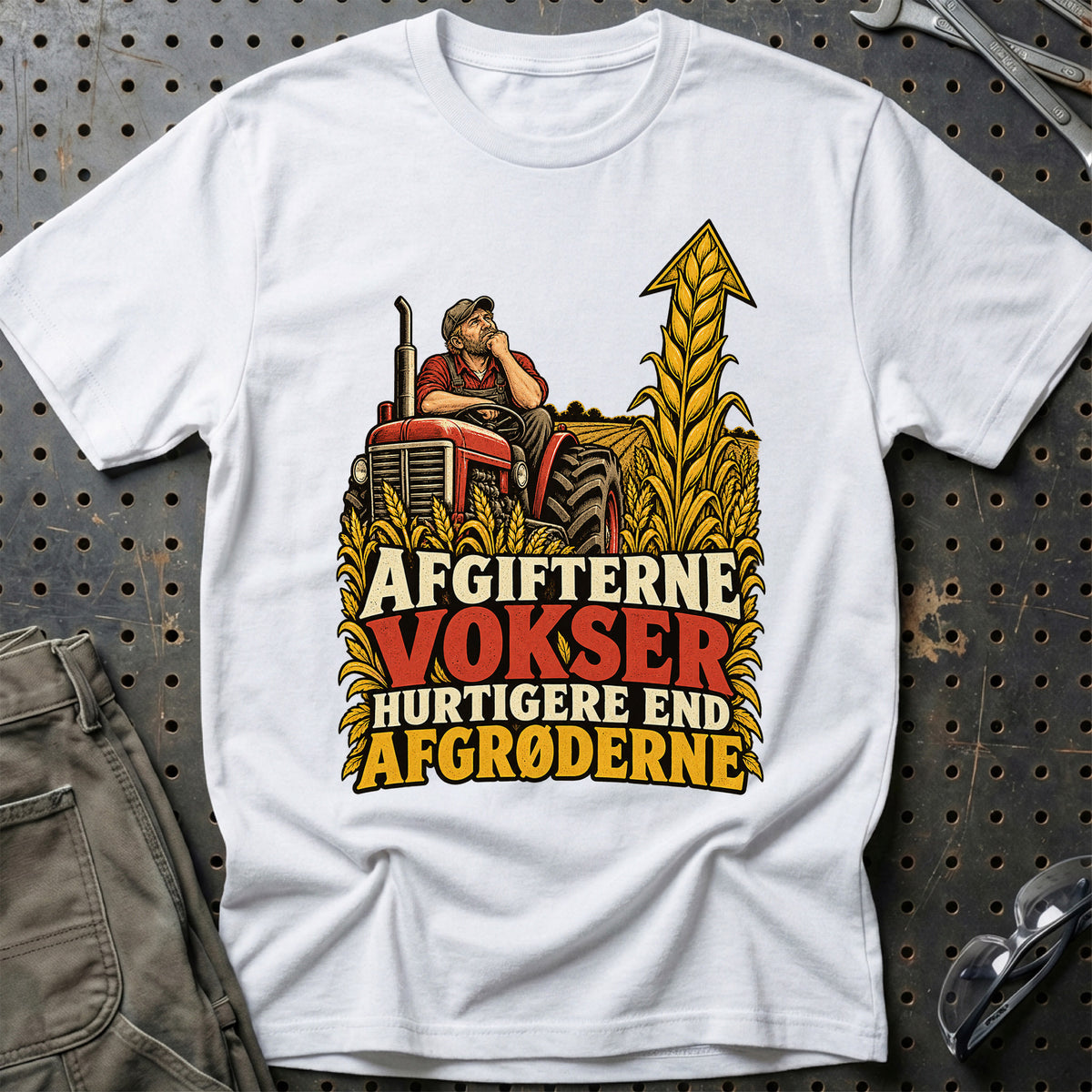 
Afgifterne vokser hurtigere end afgrøderne – Illustration – Unisex T-Shirt – Hvid